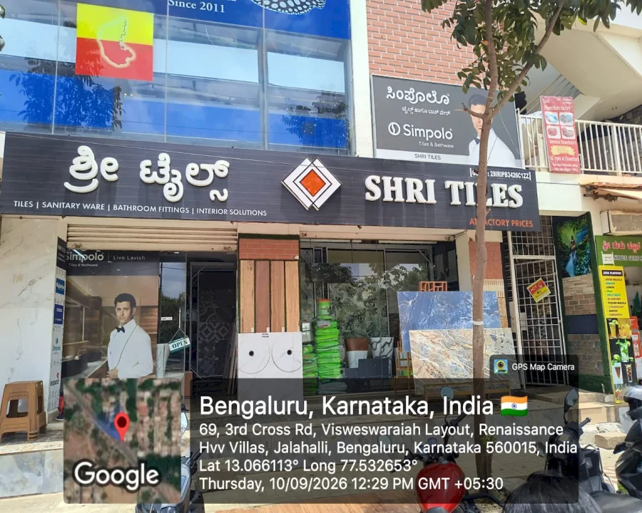 Street view of the Shri Tiles showroom signboard in KG Halli