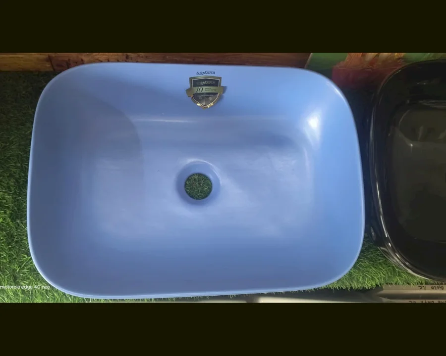 Blue rectangular countertop wash basin at Shri Tiles