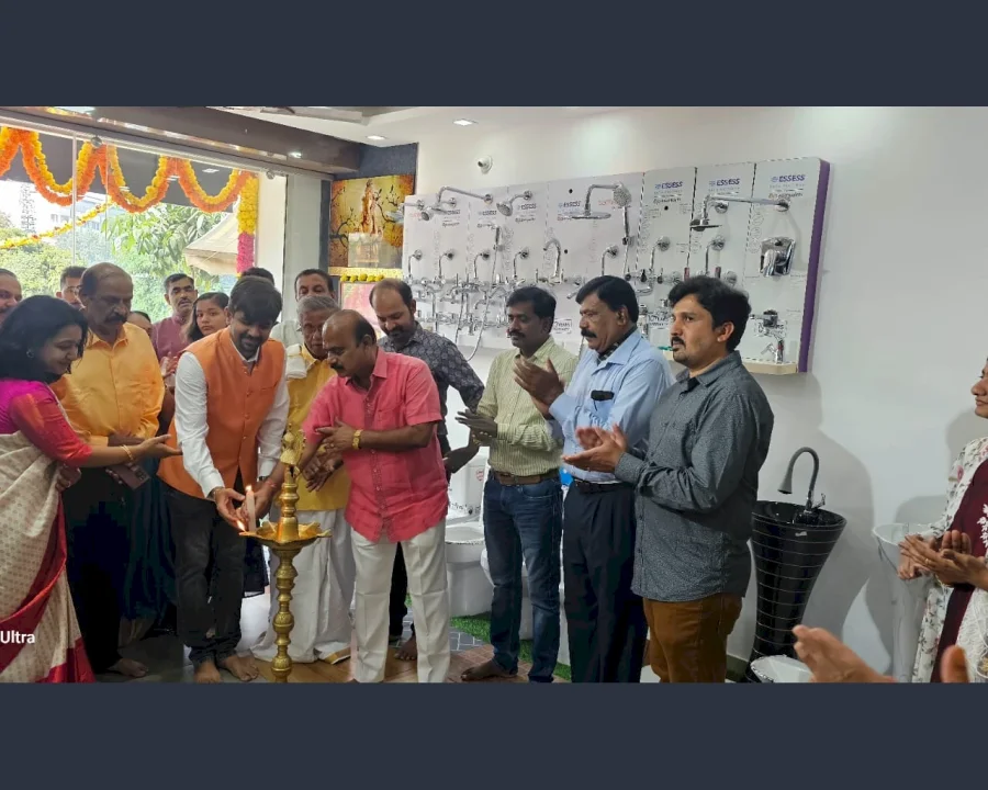 Guests lighting the lamp at the Shri Tiles showroom inauguration